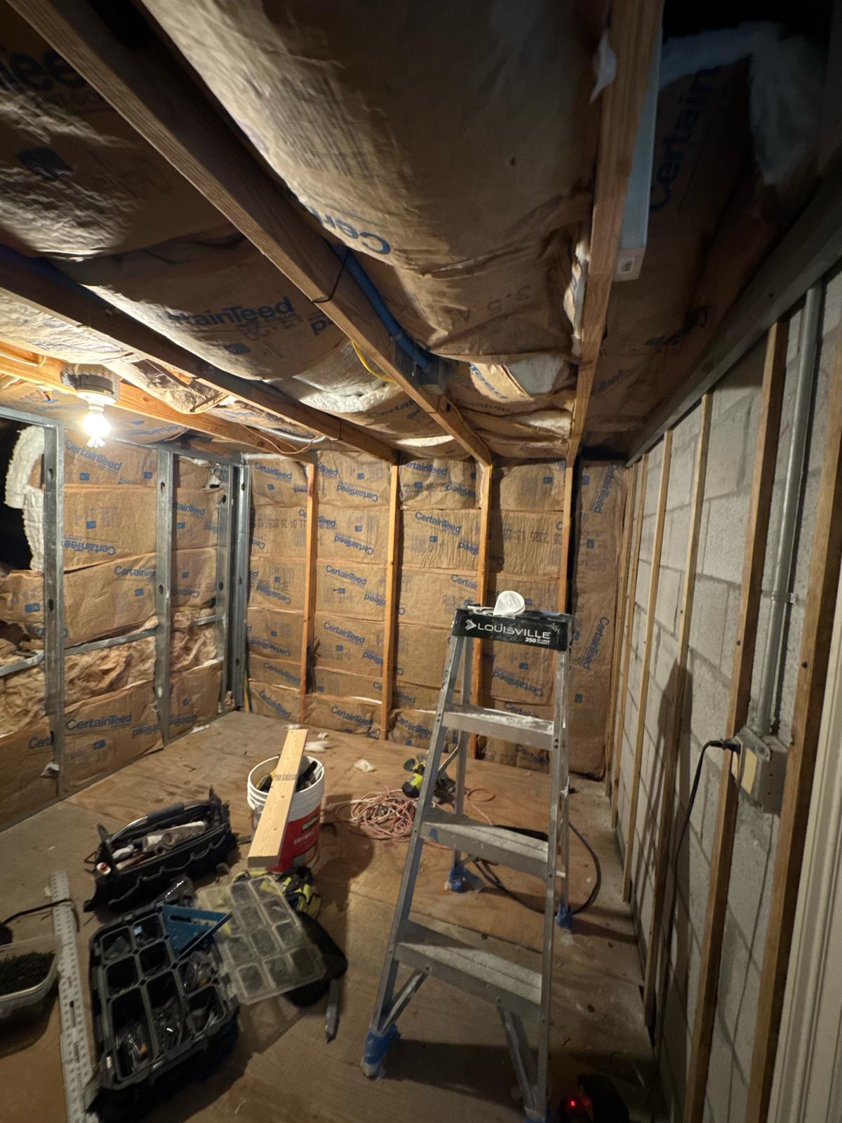 Insulated room with tools and materials on site