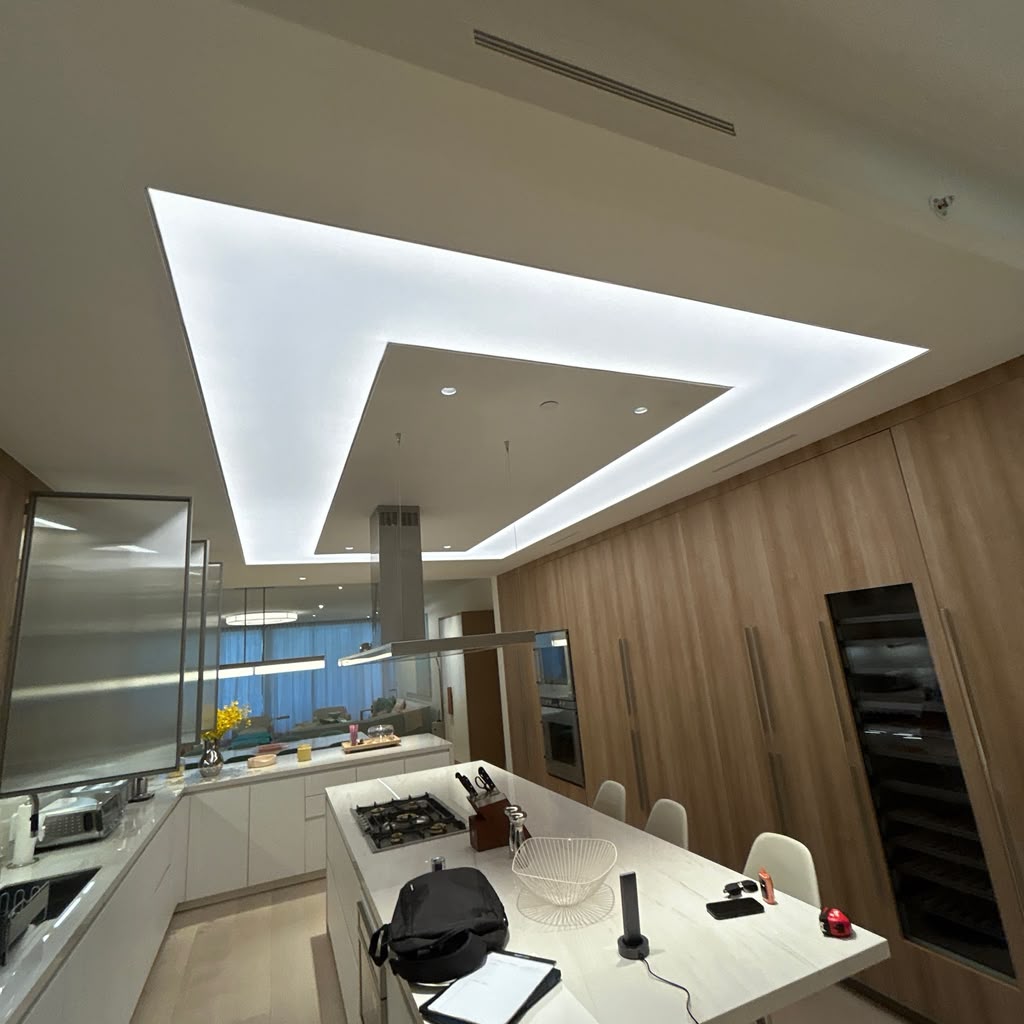 Custom kitchen with architectural ceiling lighting