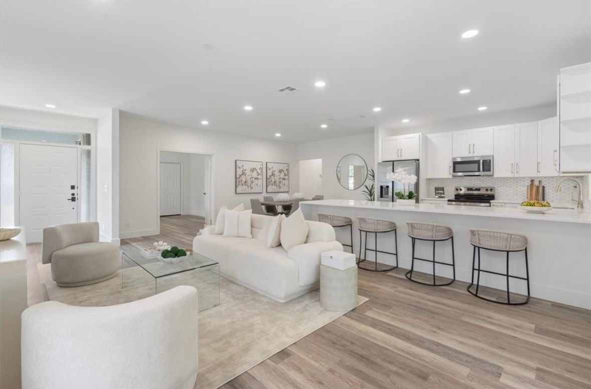 Bright open-plan kitchen and living space after renovation